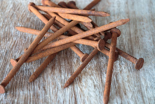 brown,rusty,nails,on,wooden,board