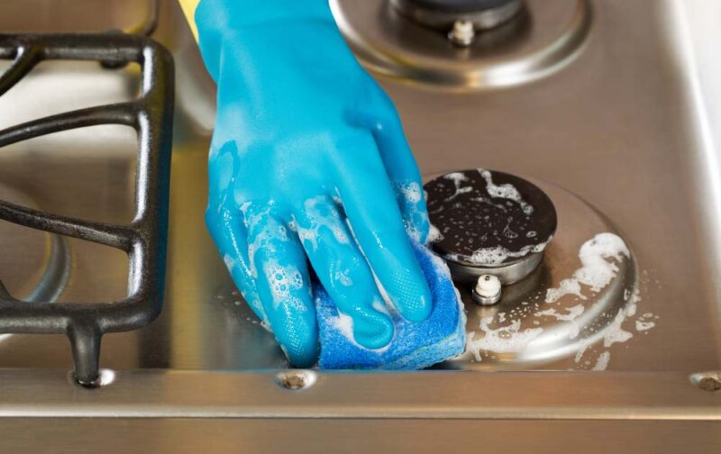 How to clean a clogged stove burner