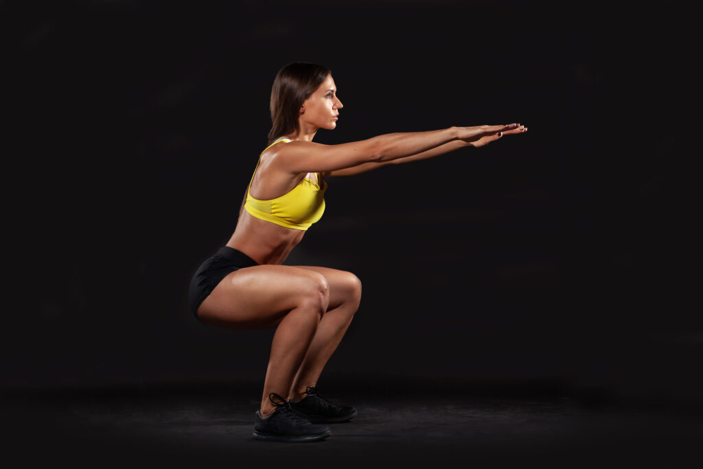 fitness female doing squat exercise